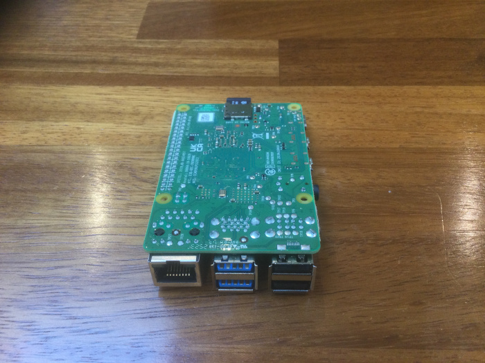 The Raspberry Pi circuit board with the Micro-SD card inserted